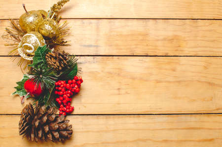 Wooden table with Christmas decorations. Christmas season decoration, blank space.