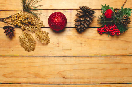 Wooden table with Christmas decorations. Christmas season decoration, blank space.