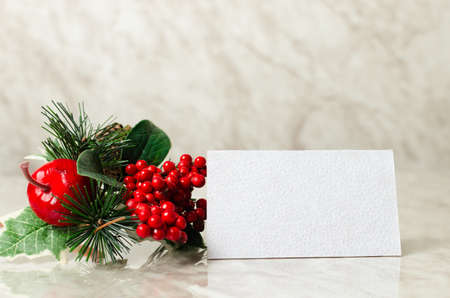 Business card mockup on table with plantの写真素材
