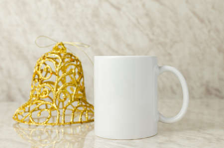 Coffee cup mockup on table with Christmas decoration.の写真素材