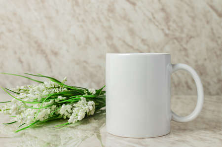 Coffee cup mockup on table with Christmas decoration.の写真素材