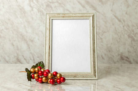Gift or greeting postcard mockup for Christmas or commemorative moment. Christmas colors, 5x7 inch postcard, editable.の写真素材