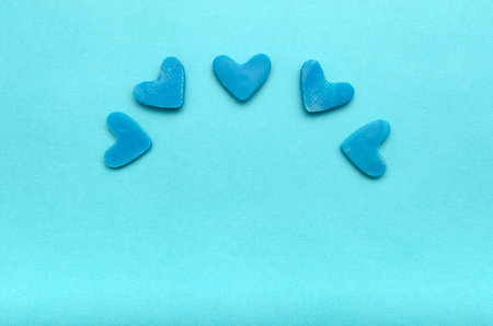 Hearts on blue background. Background for Valentine's Day.の写真素材