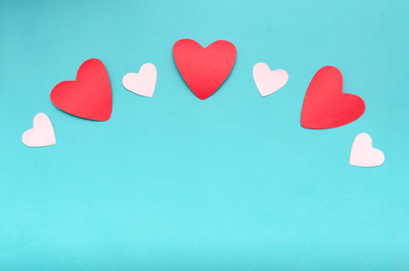 Hearts on blue background. Background for Valentine's Day.の写真素材