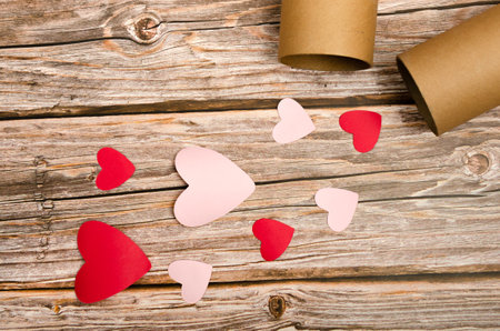 Wooden background with red and white hearts. Background for Valentine's day.の写真素材