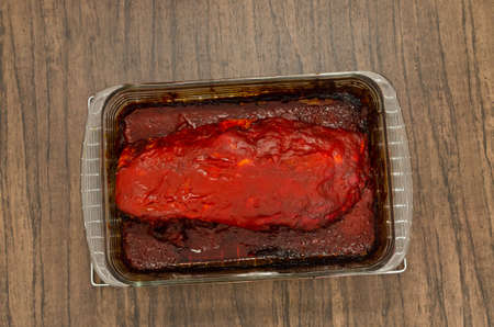 Roasted ribs marinated with barbecue sauce on wooden table.の写真素材