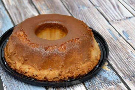 Homemade bread pudding on wooden table.の写真素材