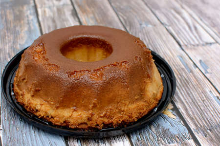 Homemade bread pudding on wooden table.の写真素材