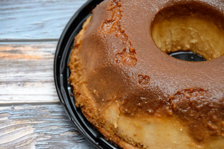 Homemade bread pudding on wooden table.の写真素材