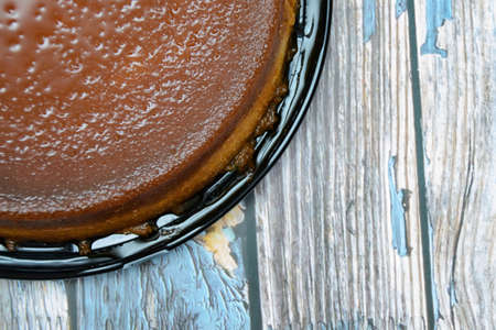 Homemade bread pudding on wooden table.の写真素材