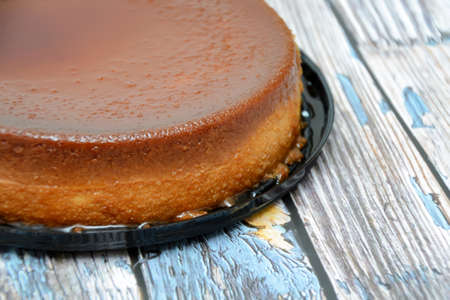 Homemade bread pudding on wooden table.の写真素材