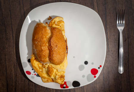 Homemade Egg Tart, Cake served on a plate on wooden table.の写真素材