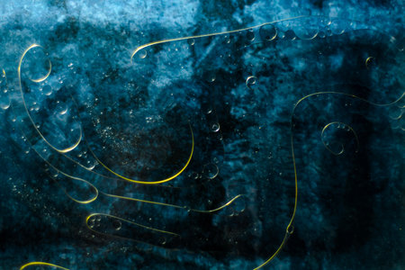 Abstract colorful background. Mixture of water and oil on colored background.