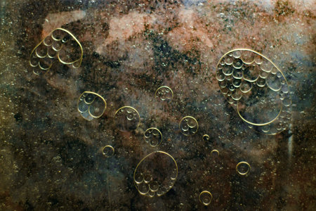 Abstract colorful background. Mixture of water and oil on colored background.