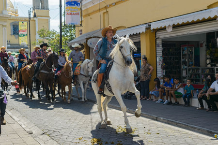 Colima, Colima, Mexico. February 11, 2023. Man riding a horse in the horseback riding for the charro bullfighting festivities in the city of Villa de Alvarez.の写真素材