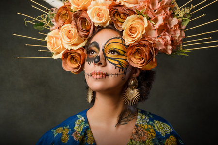 Portrait of a woman with sugar skull makeup. Day of the dead and halloween character with dark background.の写真素材