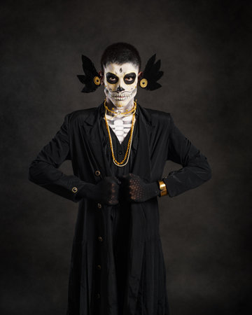 Studio portrait of catrÃ­n. Day of the dead celebration.