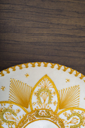 Mexican charro hat on wooden table. Mariachi hat. Typical mexican hat.の写真素材