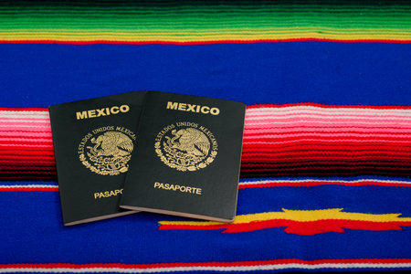 Mexican passport on colorful serape. Mexicanity concept.の写真素材
