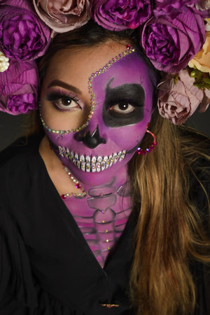 Santa Muerte, day of the dead character. Portrait of a woman with sugar skull makeup. Halloween...