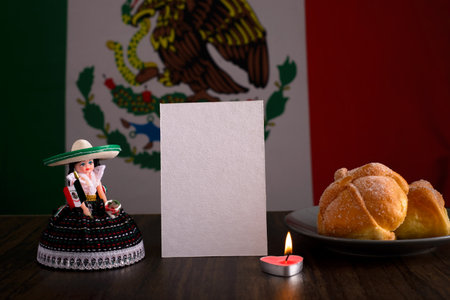 Dead bread, mexican handicrafts and blank card with mexican flag in the background. Day of the dead mockup.の写真素材