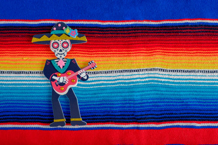 Catrin figure on colorful serape. Day of the Dead Celebration.の写真素材