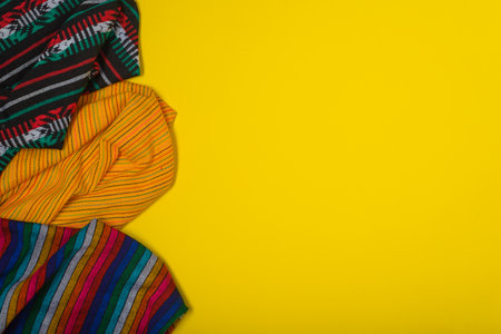 Serape on yellow background. Mexican independence concept. Cinco de mayo background.の写真素材