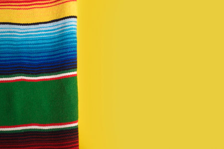Serape on yellow background. Cinco de mayo background.の写真素材