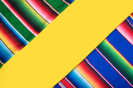 Serape on yellow background. Cinco de mayo background.の写真素材