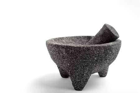 Molcajete, Mexican kitchen utensil isolated on white background.の写真素材