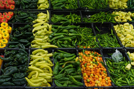 Variety of chili peppers on supermarket shelves in Mexico.