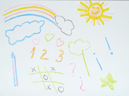 A vibrant child's crayon drawing features a rainbow, smiling sun, clouds, hearts, numbers 1-3, a tic-tac-toe gameの写真素材