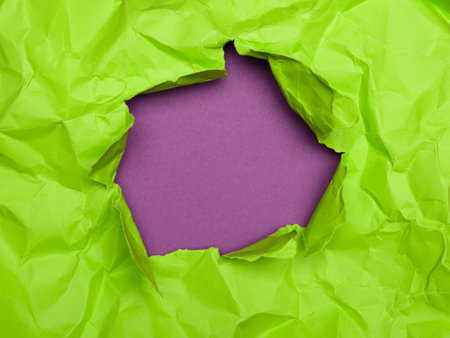 Lime Green Crumpled Paper Reveals Purple Background