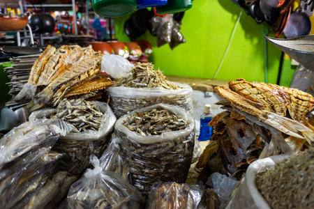 Vivid Market Scene Featuring Various Types of Dried Fish and Seafoodの写真素材