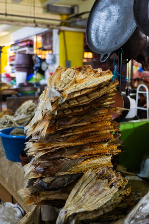 Stacked Close up Display of Delicious Dried Salted Fish at Market Stallの写真素材