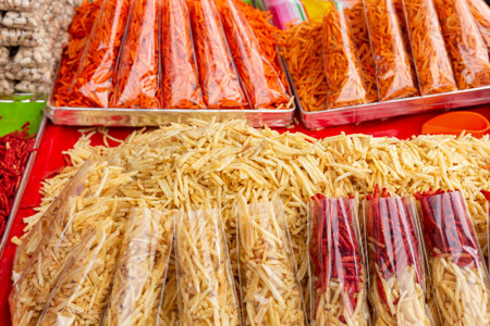 Freshly Prepared and Packaged Fried Potato Sticks Snack at Street Food Vendorの写真素材