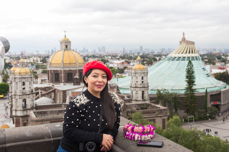 Authentic Serene Woman Wearing Beret with Basilica of Guadalupe in Backgroundの写真素材