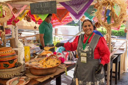 Cuernavaca, Morelos. Mexico. November 7, 2025. X World Forum on Mexican Gastronomy. Mexican Woman Selling Traditional Food at Local Marketのeditorial素材