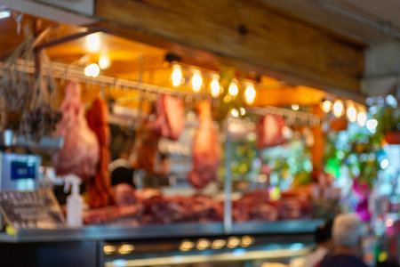 Blurred background of the meat display case in a traditional butcher shop.の写真素材