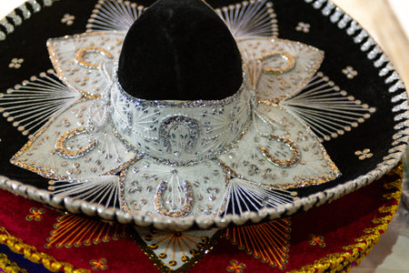 A close-up showcasing the intricate embroidery and details of a traditional mariachi hatの写真素材