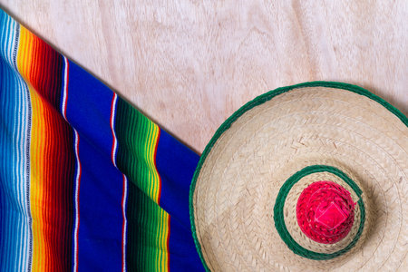 Authentic Poncho and Sombrero for Cinco de Mayo Celebration Still Life. Background.