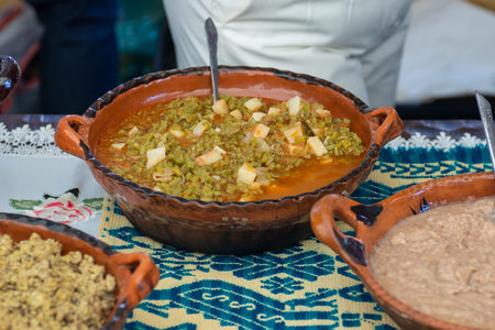 Close up of Traditional Nopales Stew Cuisine Served on a Colorful Tableの写真素材