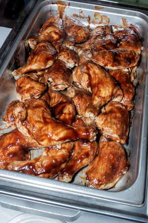 BBQ chicken dinner for a wedding reception buffet.の写真素材