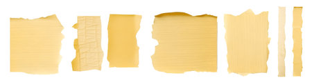 Stripes of light ripped yellow textured adhesive kraft paper masking tape on white background cutout file. Mockup template for artwork design. Many different size and lengthの写真素材