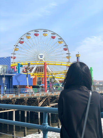 Colorado Avenue, California, USA, December 13, 2022: Ferris Wheel at Santa Monica Pier, Pacific Park, Santa Monica Mountains National Recreation Areaのeditorial素材