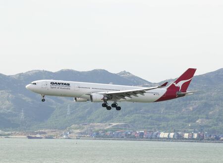 HONG KONG - May 28: Qantas Airways Airbus 330 arrive in Hong Kong International Airport on May 28,...