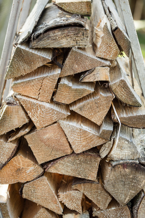 Single pieces of wood stacked to a heap