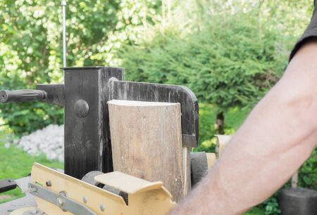 Firewood split with wooden splitter