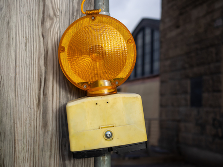 A warning light of a construction site in the cityの写真素材