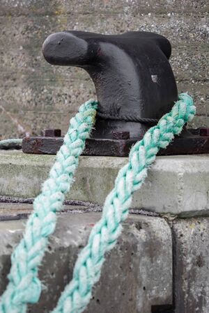 An old, used rope somewhere at the harbor